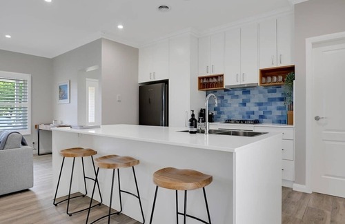 Orange House | Stylish Paradise on Prince - Pet Friendly with Great Amenities