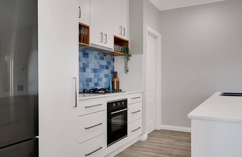 Orange House | Stylish Paradise on Prince - Pet Friendly with Great Amenities
