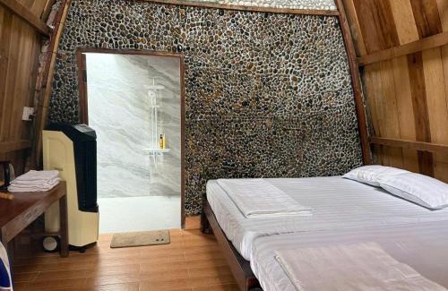Quan Tom House | Escape to Paradise on the Tree: Pet-Friendly Getaway