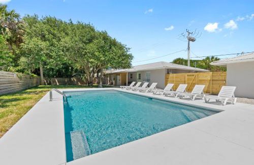 Coquina Gables Apartment | Paradise Palms Tropic Suite: Poolside Bliss Steps to Ocean