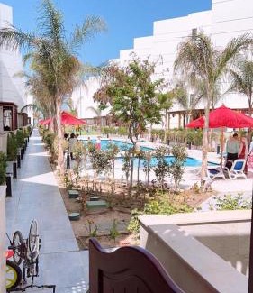 Al-Manasrah Apartment | Port Said Resort: Oceanfront Retreat with Private Beach