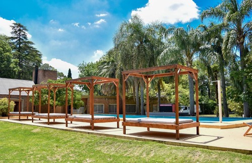 Funes Apartment | Discover Parador 15: Family-Friendly with Pool & Top Rated