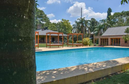 Funes Apartment | Discover Parador 15: Family-Friendly with Pool & Top Rated