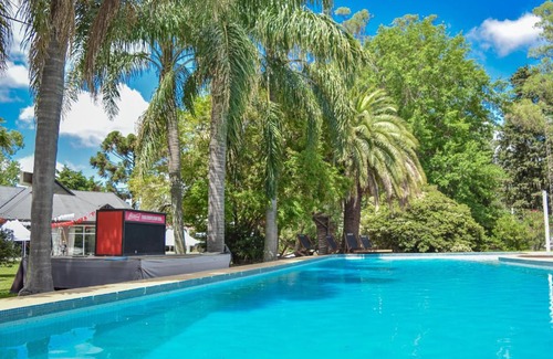 Funes Apartment | Discover Parador 15: Family-Friendly with Pool & Top Rated