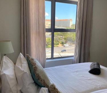 Observatory Apartment | Bright and Inviting: Paragon Domain with Pool Access