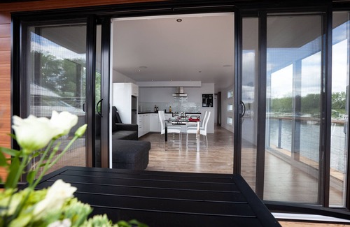 Mauricie House | Experience the Unique Parc de l'île Melville Floating Home