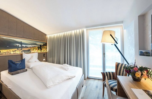 Campi al Lago Hotel | Indulge at Parc Hotel am See: 4-Star Retreat with Spa