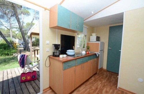 Puget-sur-Argens RV Rental | Ideal Retreat at Parc Saint James Oasis Village with Spa