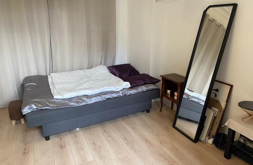 Quartier des peupliers Apartment | Elegant Paris Room by Renowned Designer, Family-Friendly
