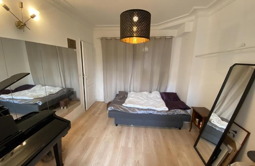 Quartier des peupliers Apartment | Elegant Paris Room by Renowned Designer, Family-Friendly