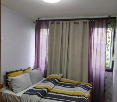 Cite Paul Eluard House | Budget-Friendly Parisian Room Steps from Metro Access
