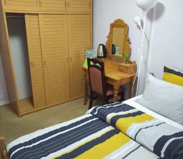 Cite Paul Eluard House | Budget-Friendly Parisian Room Steps from Metro Access