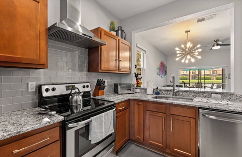 Kissimmee Resort | Lakefront Oasis: 10 Min to Disney with Pool and Spa Access