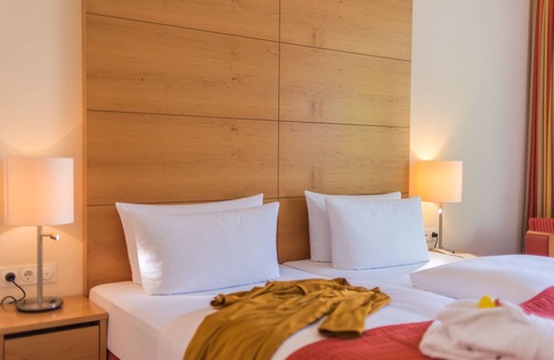 Warnemuende Hotel | Discover Park-Hotel Hübner: Spa, Pool & Family-Friendly Fun