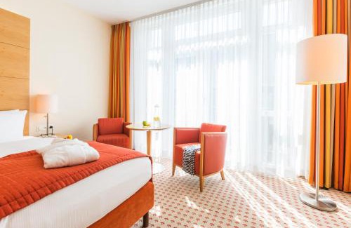 Warnemuende Hotel | Discover Park-Hotel Hübner: Pet-Friendly Oceanfront Retreat