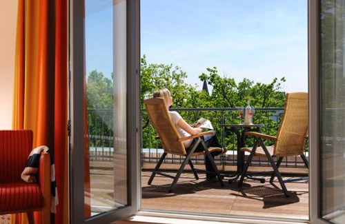 Warnemuende Hotel | Discover Park-Hotel Hübner: Pet-Friendly Oceanfront Retreat