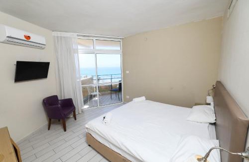 Netanya House | Discover Oceanfront Comfort at Park Hotel with Pool Access