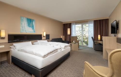 Hildesheim District Hotel | Discover Comfort at Parkhotel Berghölzchen: 4-Star Retreat