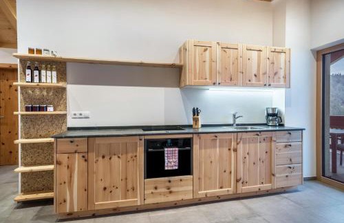 Meltina Apartment | Discover Parliflhof Apt Langfenn: Family-Friendly Retreat