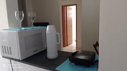 Campos Apartment | Discover Comfort at Parque Rodoviário with Pool Access