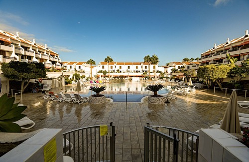 El Madronal Apartment | Sunny Parque Santiago 1: Poolside Oasis by the Sea