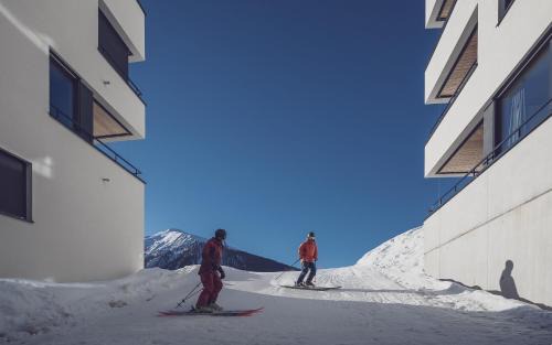 Meierhof Apartment | Experience Comfort at Parsenn Resort - 4-Star Excellence