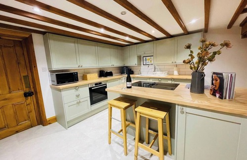 Hulme End House | Pass the Keys | The Old Shop Cosy Cottage for 6 & Furry Friends