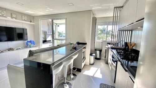 Ingleses Sul Apartment | Bright Beachside Apartment with Pool and Pet-Friendly Options