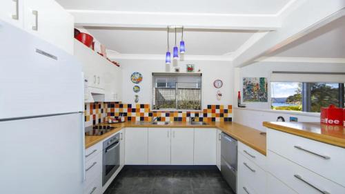 Patonga House | Patonga Corner Creek - Family-Friendly with Water Views