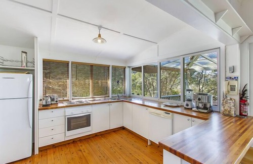 Patonga House | Experience Patonga Hillside Retreat with Oceanfront Pool