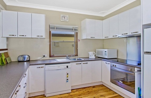 Patonga House | Beautiful Patonga Sunset: Waterfront Holiday House Awaits