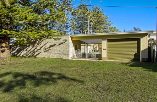 Patonga House | Beautiful Patonga Sunset: Waterfront Holiday House Awaits