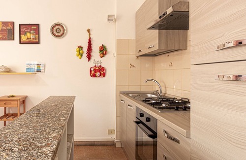 Marina di Campo Apartment | Discover PATRIZIA: Pet Friendly with Spa & Kitchen Amenities