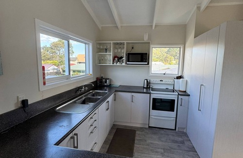 Whangamata House | Experience Patuwai: Oceanfront Stay with Pet-Friendly Perks