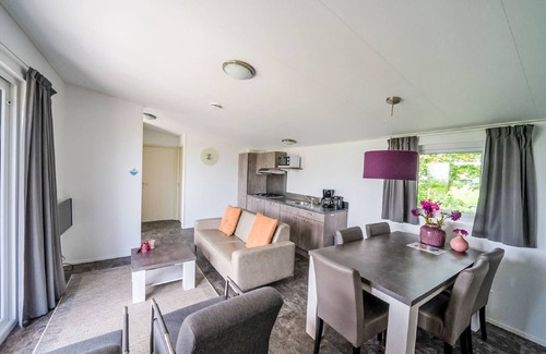 Bovenkarspel House | Relax at Pavilion 5 by Interhome with Spa and Lake Views