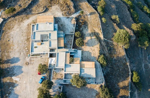 Nisyros Apartment | Discover Pavlaina Complex: Oceanfront Residences & Garden Views
