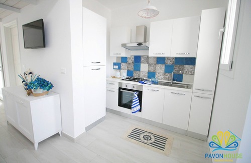 Posto Rosso House | Pavon House Blue: Family-Friendly Stay Near the Sea