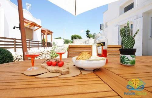 Posto Rosso House | Pavon House Blue: Family-Friendly Stay Just Steps from the Sea