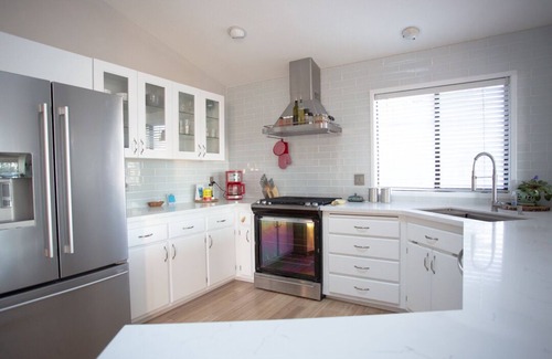 Johns Landing House | Elegant PDX Penthouse with Atrium Views and Spa Amenities
