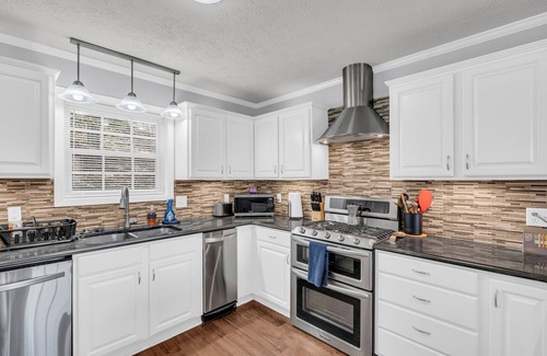 Columbus House | Peaceful 4BR house in charming Columbus - Hot-tub+Gameroom+TVs in every room!