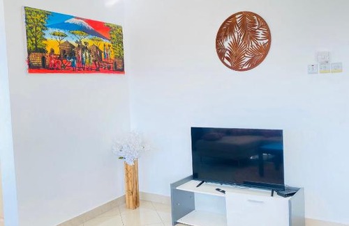 Mbezi Beach Apartment | Serene Beach Escape with Pool and Family-Friendly Vibes