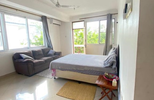 Mbezi Beach Apartment | Serene Beach Escape with Pool and Family-Friendly Vibes