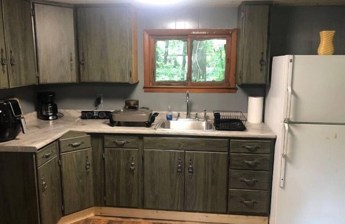 Westphalia Cabin | Serene Cabin Retreat by the Lake with Family-Friendly Amenities