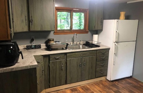 Westphalia Cabin | Serene Cabin Retreat by the Lake with Family-Friendly Amenities