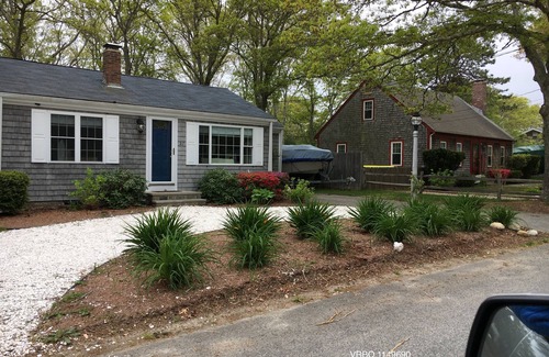 East Falmouth House | Tranquil Cottage: Family-Friendly Oasis with Oceanfront Views