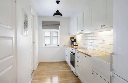 Glomset Apartment | Peaceful countryside apartment near Ålesund. Fjord & Mountain views & garden