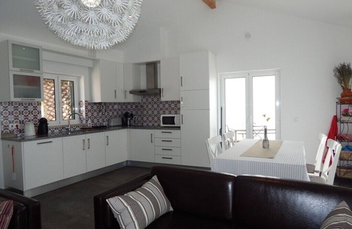 Mouraria Cottage | Tranquil Family Retreat with Pool, Steps from the Beach