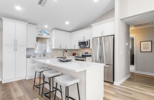 Trafalgar House | Inviting Pool Home with Ocean View on Freshwater Canal