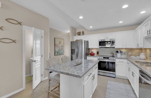 Laguna Vista House | Serene Bayfront Townhome with Pool & Hot Tub Access