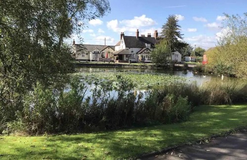 Grendon Cottage | Serene Village Cottage: Child-Friendly Retreat Awaits You